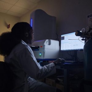 Francine B. Sado Yousseu, PhD, operating the user results interface of the MassARRAY System by Agena Bioscience
